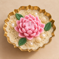Lotus Glow Urli Candle in pink with gold bowl